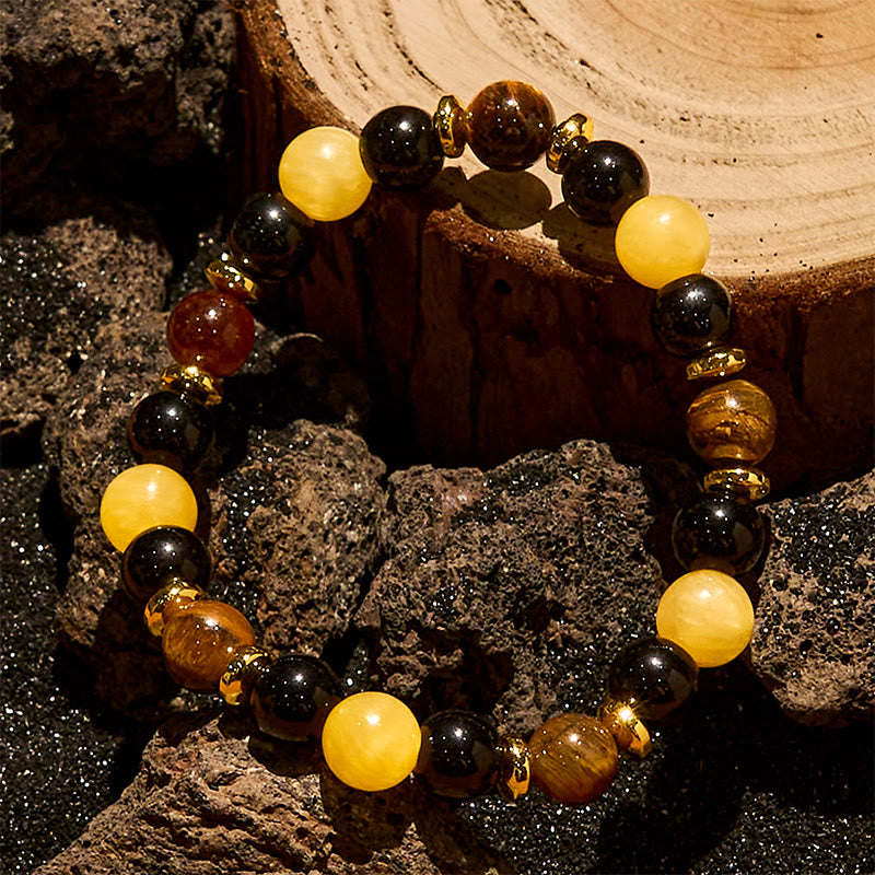 Bracciale Olivenorma con perline in ossidiana, occhio di tigre e avventurina gialla