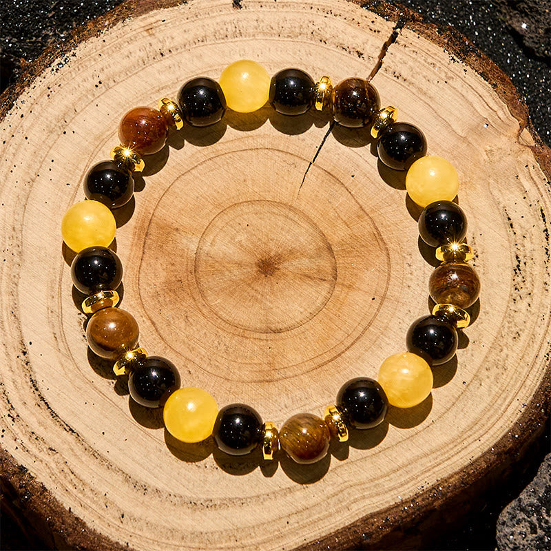 Bracciale Olivenorma con perline in ossidiana, occhio di tigre e avventurina gialla