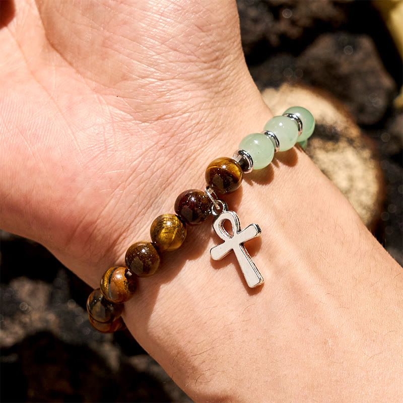 Bracciale Olivenorma con ciondolo a croce con perline in avventurina verde e occhio di tigre