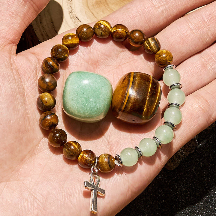 Bracciale Olivenorma con ciondolo a croce con perline in avventurina verde e occhio di tigre