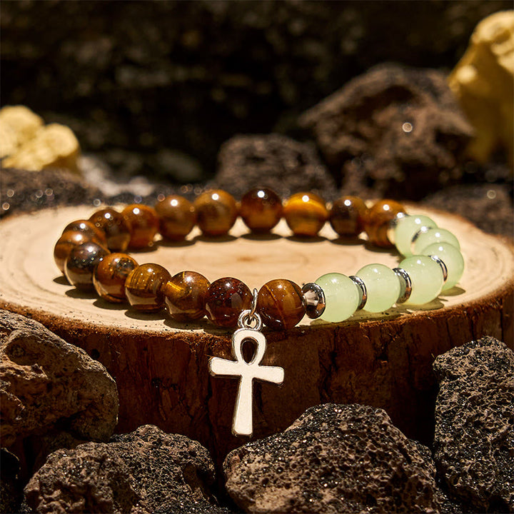Bracciale Olivenorma con ciondolo a croce con perline in avventurina verde e occhio di tigre