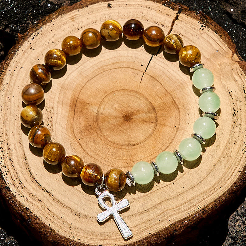 Bracciale Olivenorma con ciondolo a croce con perline in avventurina verde e occhio di tigre