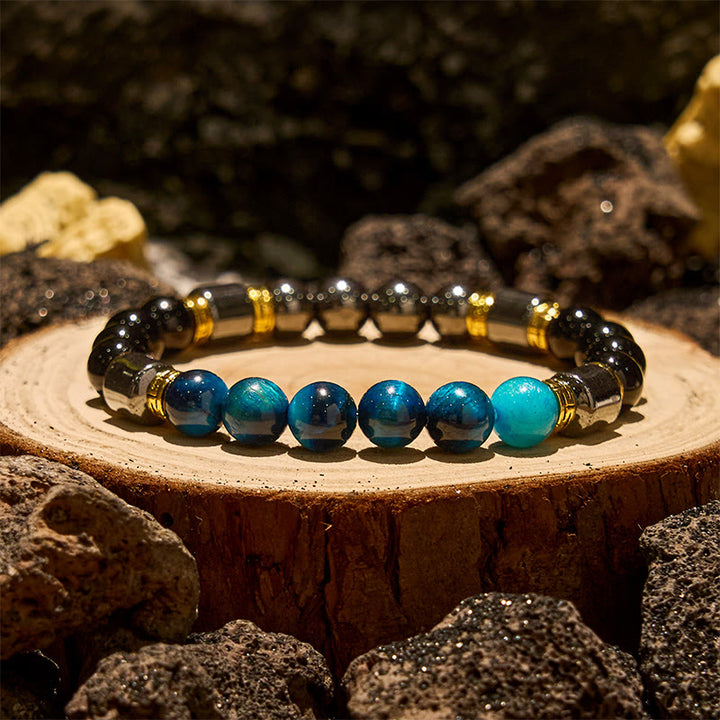 Bracciale Olivenorma con perle di ematite e ossidiana blu occhio di tigre
