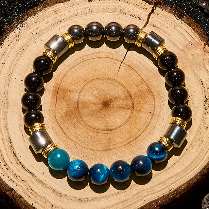 Bracciale Olivenorma con perle di ematite e ossidiana blu occhio di tigre