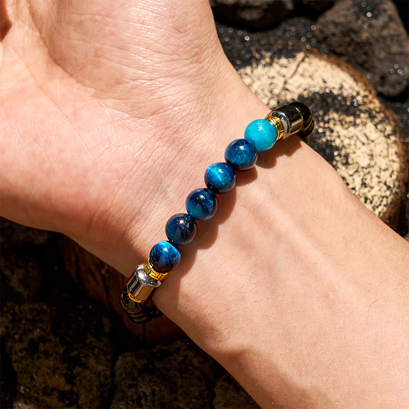 Bracciale Olivenorma con perle di ematite e ossidiana blu occhio di tigre