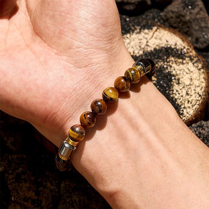 Bracciale Olivenorma con perle di ematite e ossidiana blu occhio di tigre
