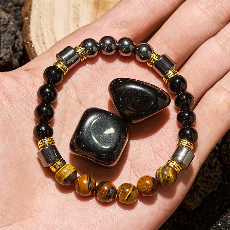 Bracciale Olivenorma con perle di ematite e ossidiana blu occhio di tigre