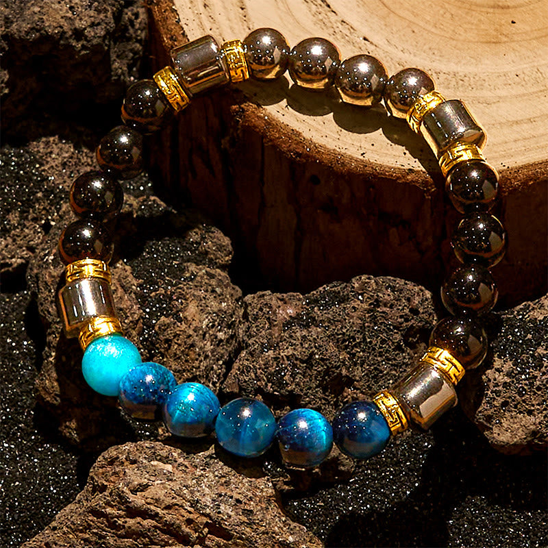 Bracciale Olivenorma con perle di ematite e ossidiana blu occhio di tigre