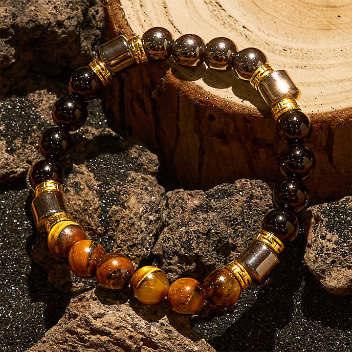 Bracciale Olivenorma con perle di ematite e ossidiana blu occhio di tigre