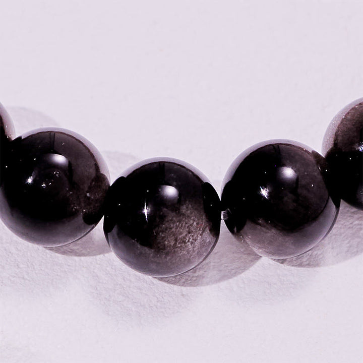 Bracciale Olivenorma con perline in quarzo fragola, argento e ossidiana