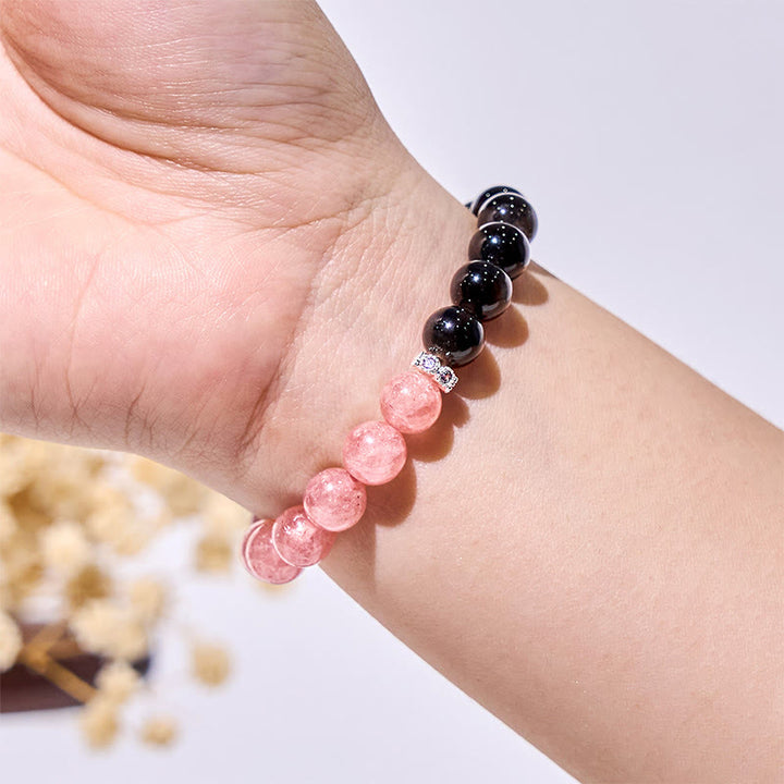 Bracciale Olivenorma con perline in quarzo fragola, argento e ossidiana