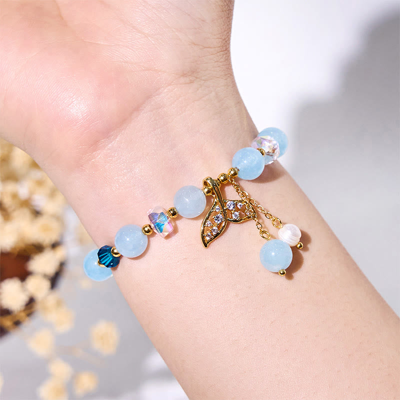 Bracciale Olivenorma con perline di vetro trasparente e coda di balena in acquamarina
