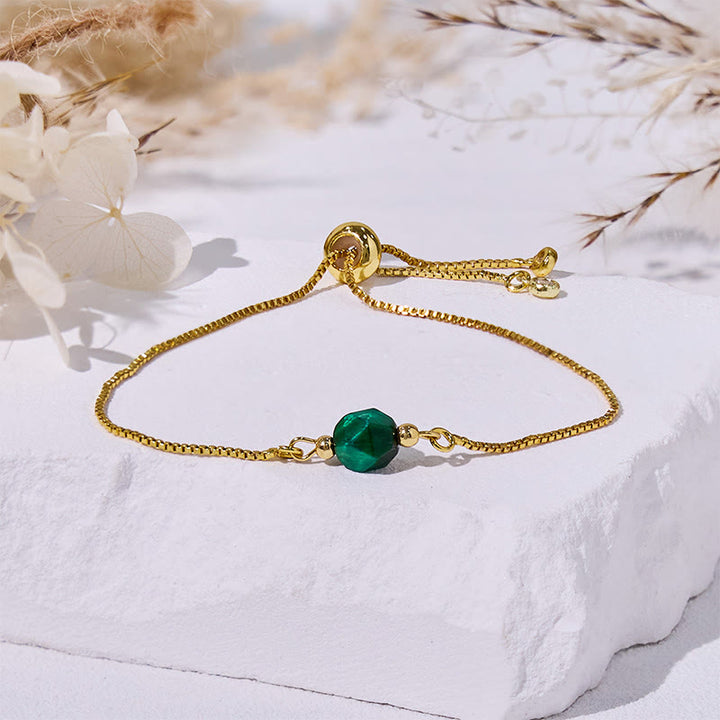 Bracciale Olivenorma con perline in occhio di tigre verde sfaccettato
