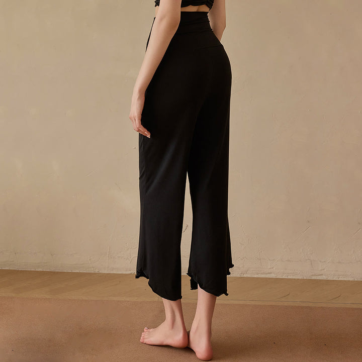 Pantaloni da yoga da donna Olivenorma a zampa, in tinta unita, elasticizzati, corti e svasati, in tessuto lycra. - image 6