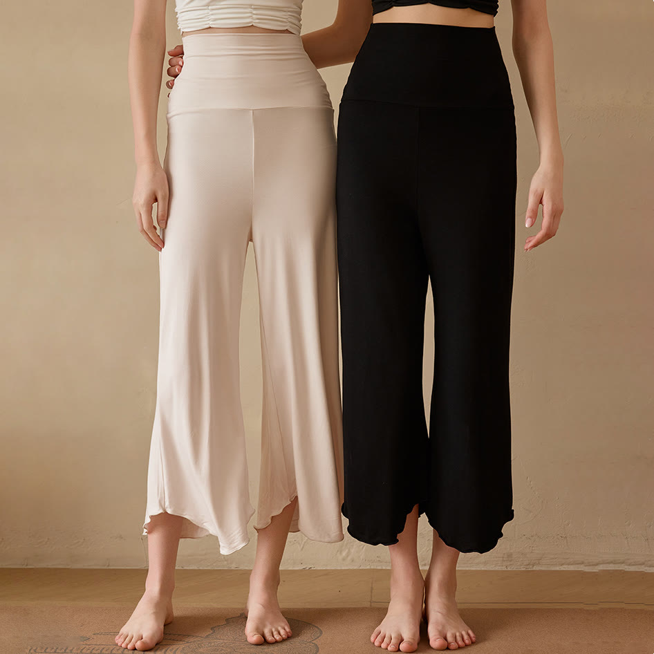 Pantaloni da yoga da donna Olivenorma a zampa, in tinta unita, elasticizzati, corti e svasati, in tessuto lycra. - image 0