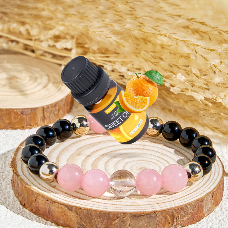 Braccialetto con oli essenziali "Rosé & Night" di Olivenorma per amore e protezione - Bracciale + Olio Essenziale di Arancia Dolce - image 1
