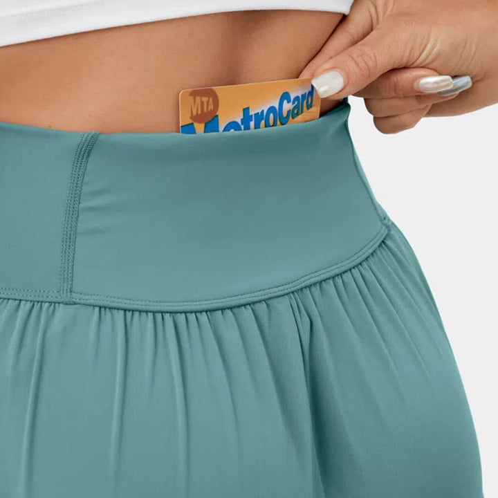 Olivenorma Pantaloni da yoga elasticizzati con spacchi larghi da donna