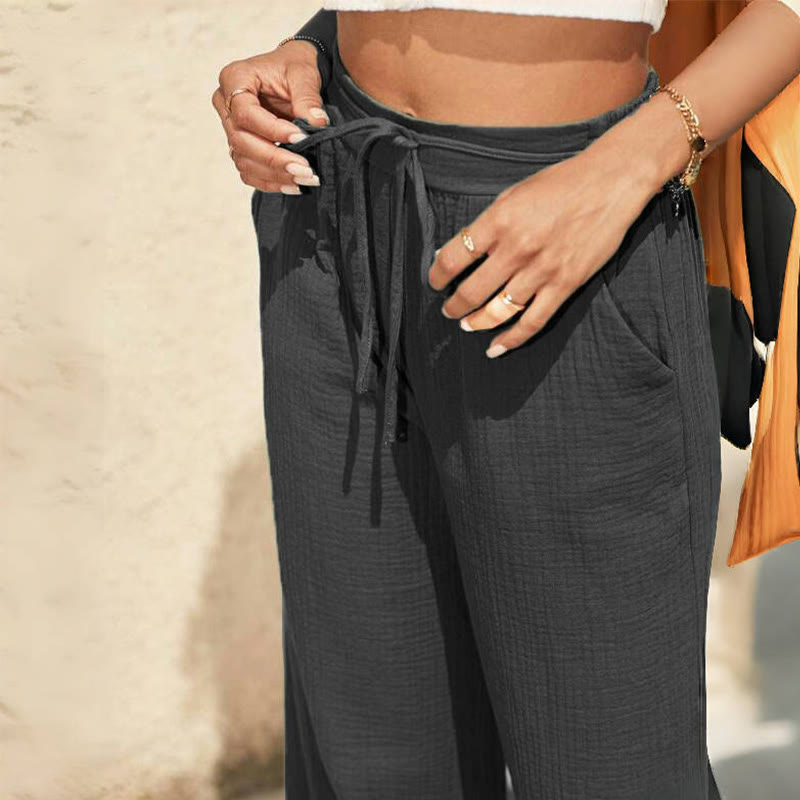 Olivenorma - Pantaloni larghi da donna elasticizzati in lino tinta unita, a vita media, con tasche - image 2