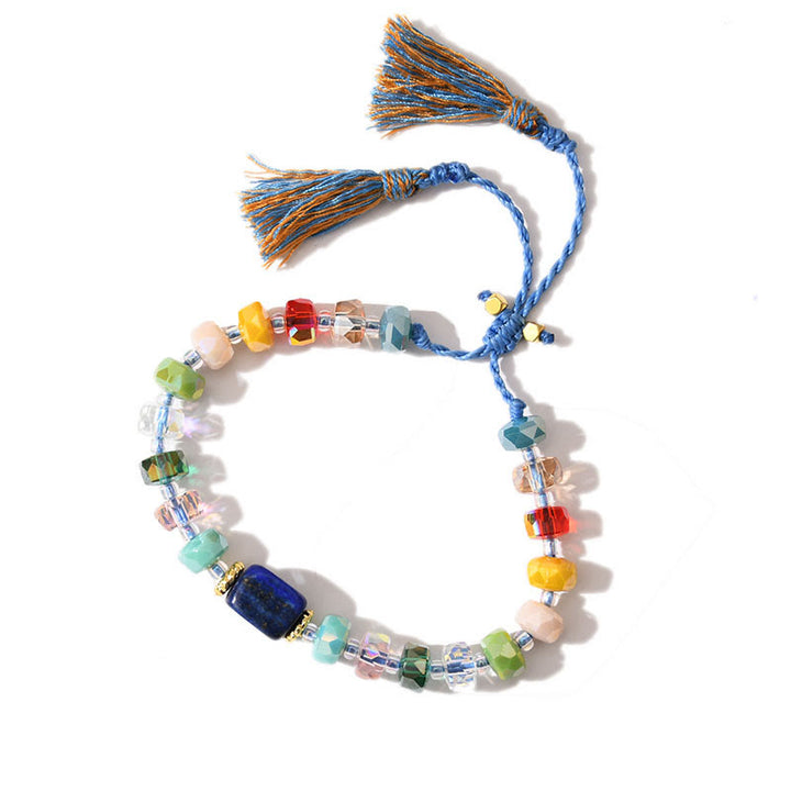 Bracciale intrecciato con pietre preziose e nappe glitterate in stile boho di Olivenorma - Lapislazzuli + smalto arcobaleno - image 3