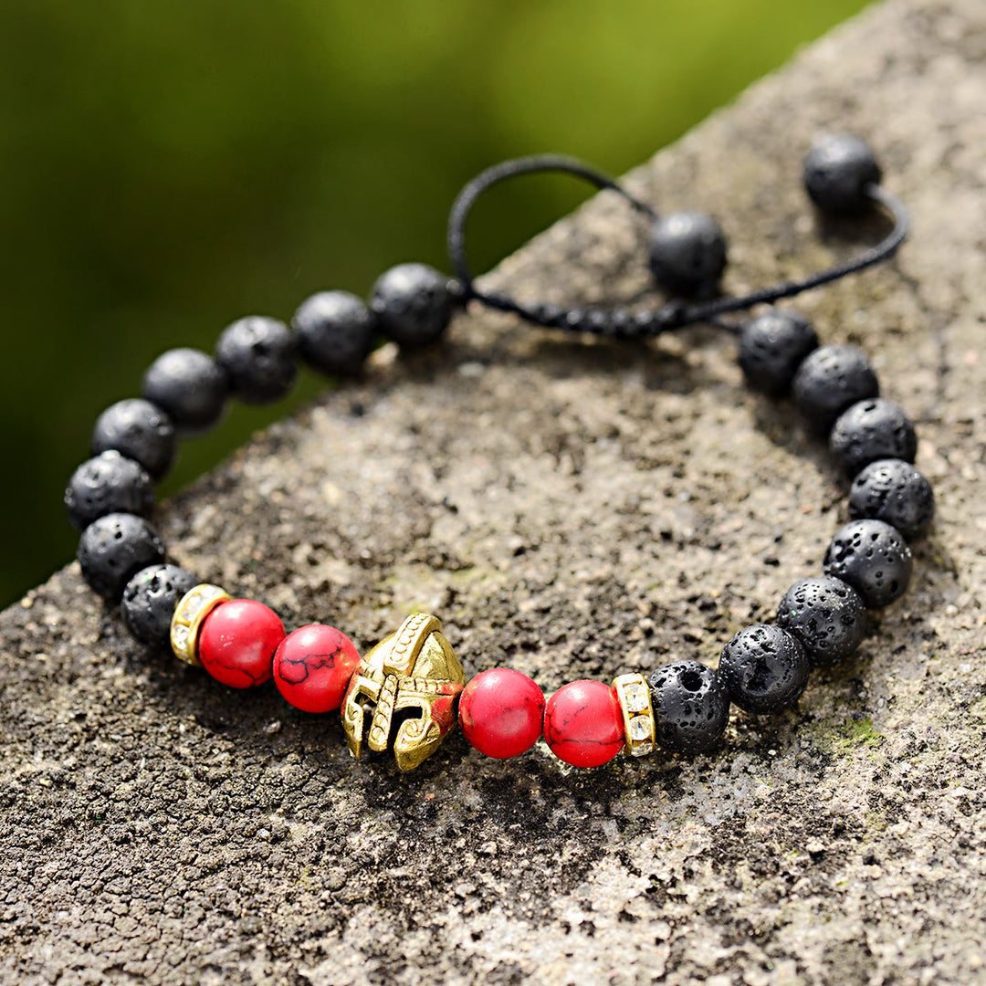 Bracciale Olivenorma con elmo da guerriero spartano regolabile da 8 mm con pietre preziose - Pietra lavica + turchese rosso + casco dorato - image 1