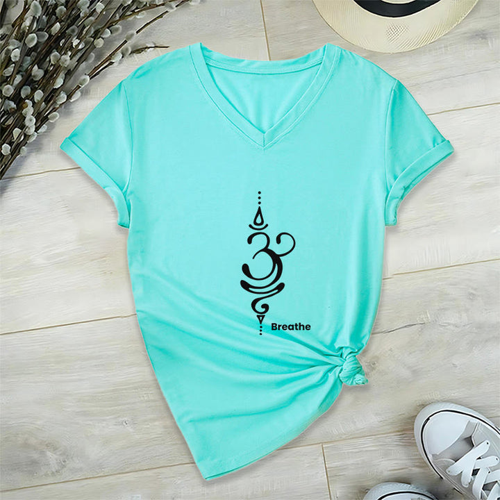 Olivenorma Breathe Symbol - Maglietta da meditazione yoga in cotone a maniche corte con scollo a V da donna - Ciano - 2XL - image 16