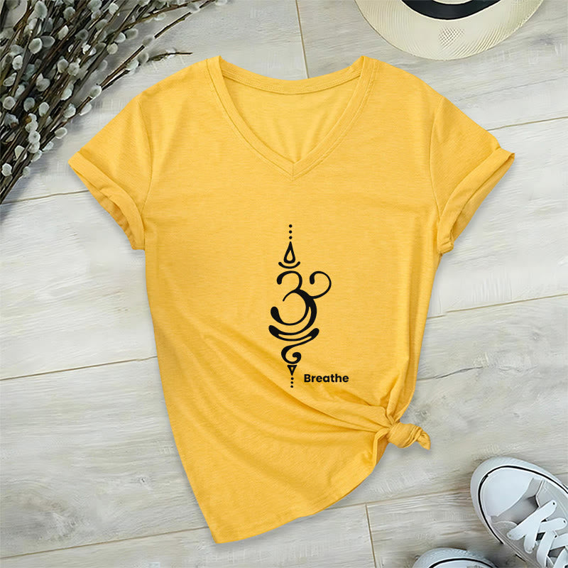 Olivenorma Breathe Symbol - Maglietta da meditazione yoga in cotone a maniche corte con scollo a V da donna - Giallo - 2XL - image 14