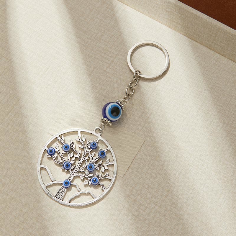 Portachiavi creativo Olivenorma con occhio malvagio blu e dettagli di animali/piante - Fiore - image 3