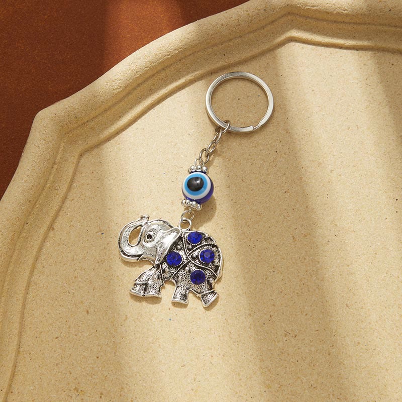 Portachiavi creativo Olivenorma con occhio malvagio blu e dettagli di animali/piante - Elefante - image 7