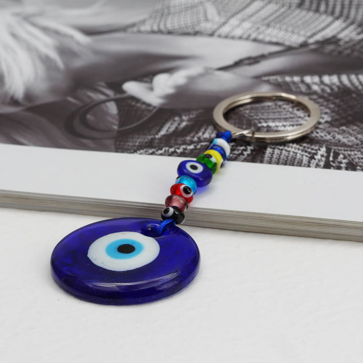 Portachiavi Olivenorma con cuore blu vibrante e occhio malvagio con più ciondoli - image 1
