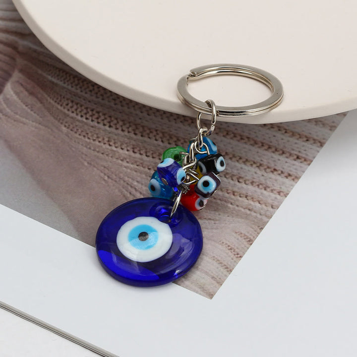 Portachiavi Olivenorma con cuore blu vibrante e occhio malvagio con più ciondoli - image 4