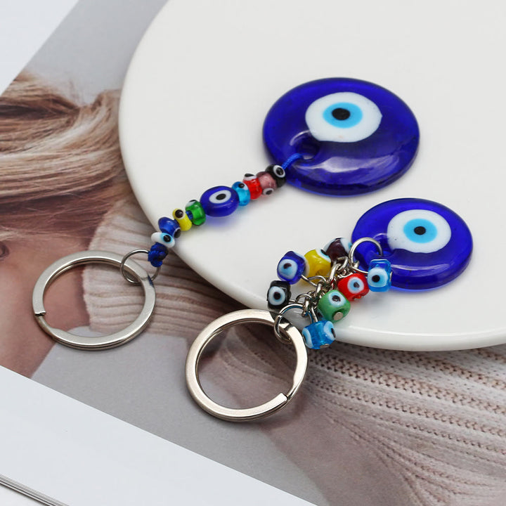 Portachiavi Olivenorma con cuore blu vibrante e occhio malvagio con più ciondoli - image 13