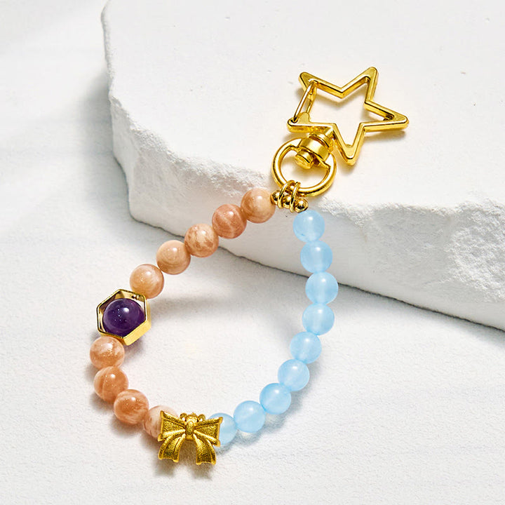 Olivenorma Portachiavi con cinturino per telefono in cristallo con pietra del sole e acquamarina - Pietra del sole e acquamarina - image 0