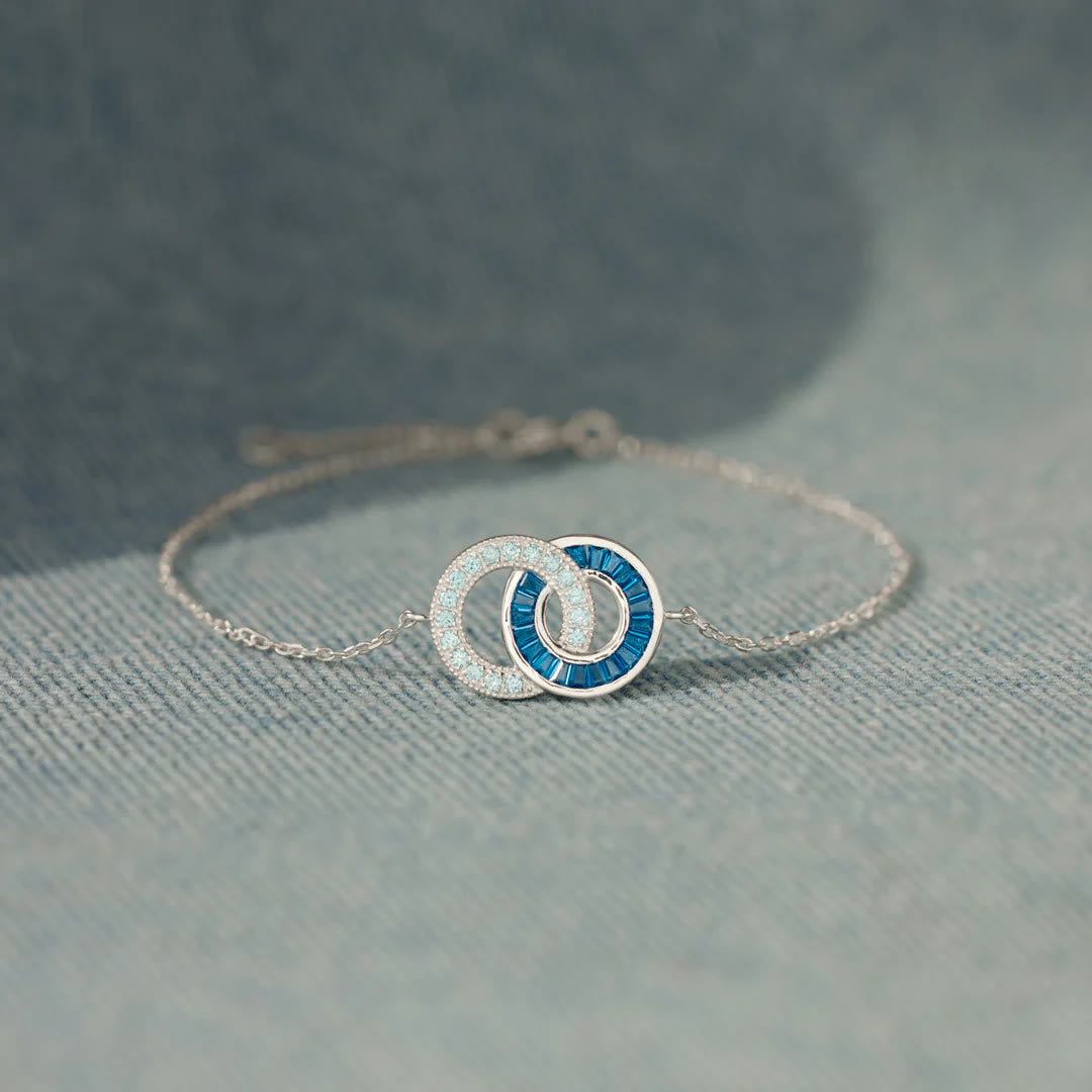 Regali personalizzati con pietra portafortuna Olivenorma per madre e figlia: bracciale e collana con cerchi intrecciati. - image 2