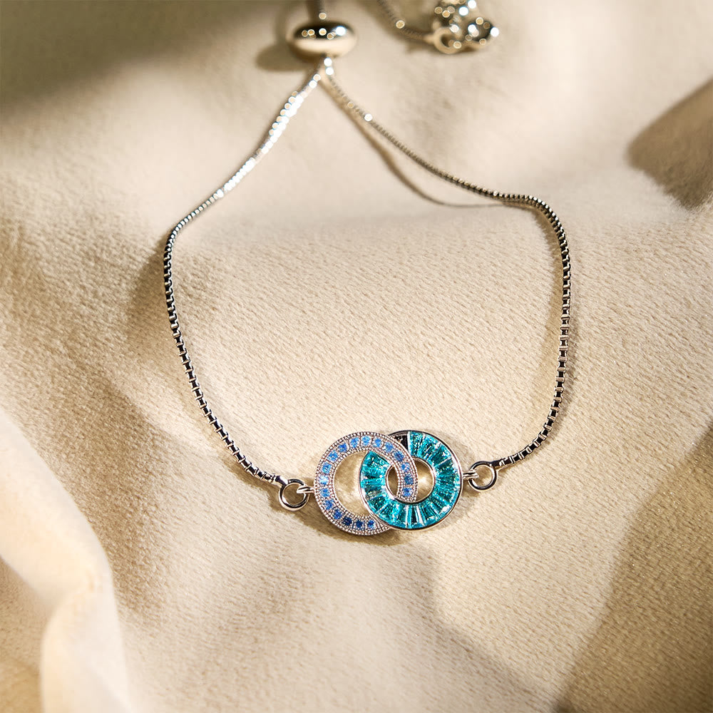 Regali personalizzati con pietra portafortuna Olivenorma per madre e figlia: bracciale e collana con cerchi intrecciati. - image 8