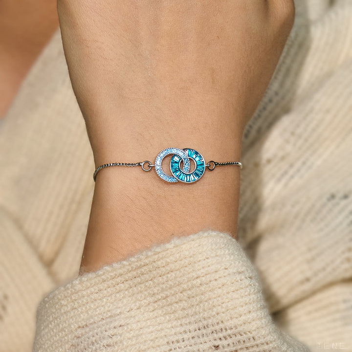 Regali personalizzati con pietra portafortuna Olivenorma per madre e figlia: bracciale e collana con cerchi intrecciati. - image 5