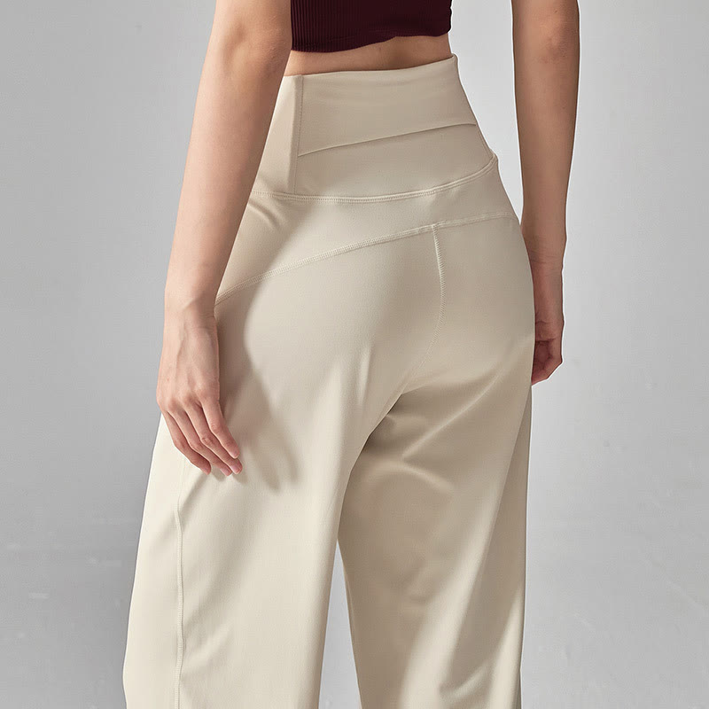 Pantaloni da yoga morbidi e drappeggiati a vita alta in tinta unita Olivenorma - image 1