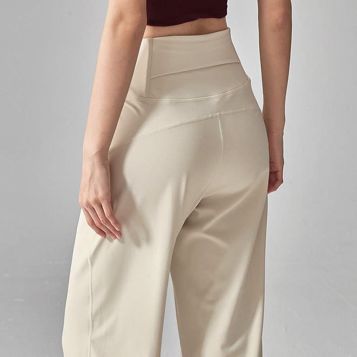 Pantaloni da yoga morbidi e drappeggiati a vita alta in tinta unita Olivenorma - image 1