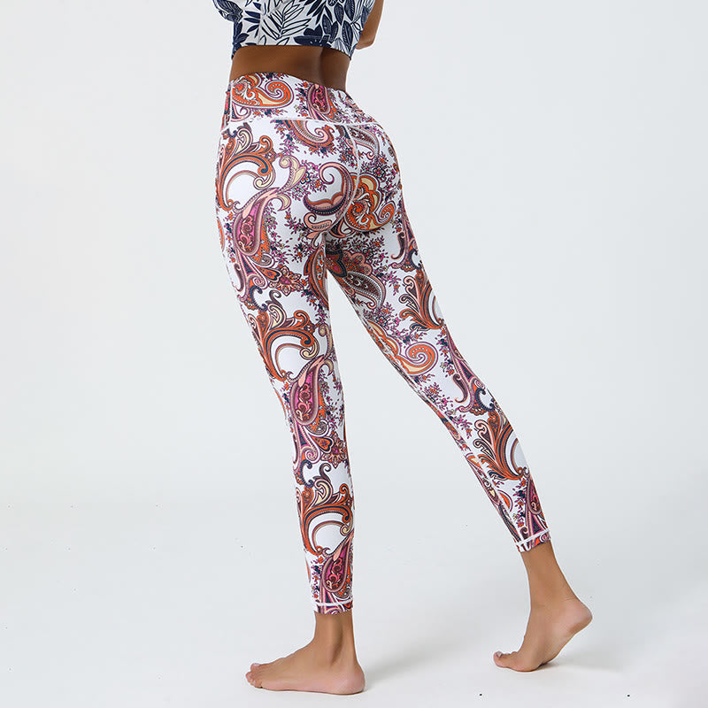 Pantaloni da yoga Olivenorma a vita alta con stampa paisley vivace - image 1