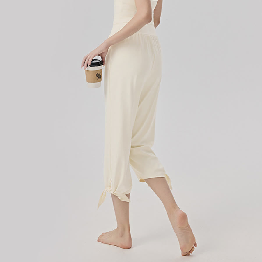 Pantaloni da yoga da donna Olivenorma a gamba larga, vita alta, asimmetrici e corti. - image 8