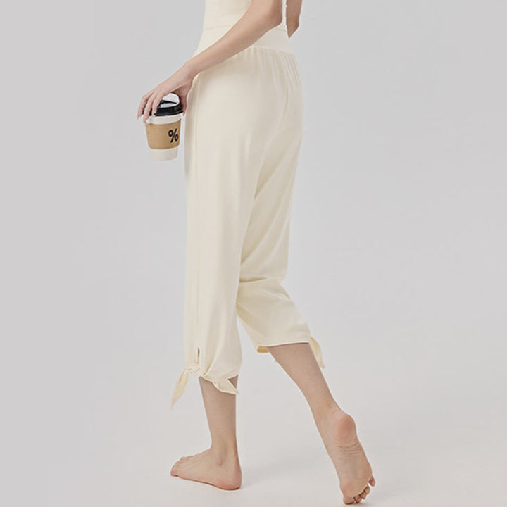 Pantaloni da yoga da donna Olivenorma a gamba larga, vita alta, asimmetrici e corti. - image 10