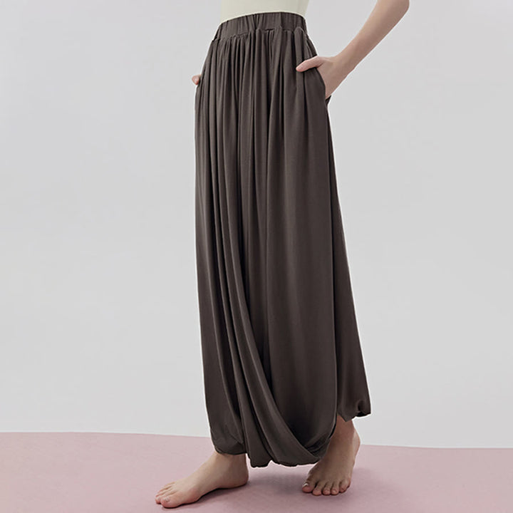 Pantaloni da yoga lunghi da donna Olivenorma a vita alta con gonna attorcigliata - image 1