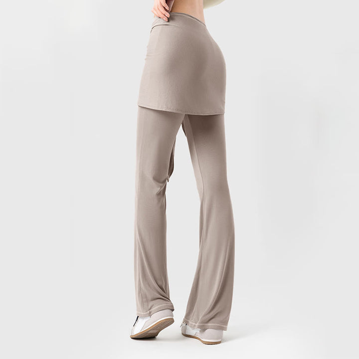 Pantaloni da yoga lunghi da donna Olivenorma a gamba svasata, vita alta, con laccetti. - image 1