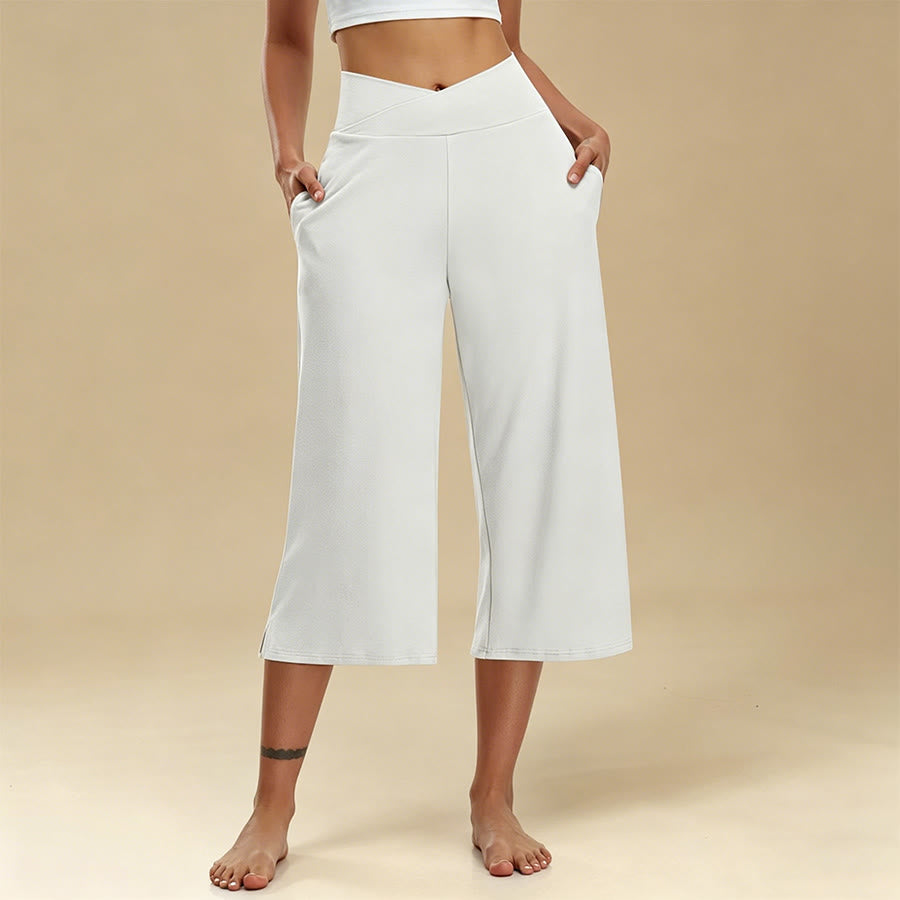 Pantaloni da yoga e fitness da donna Olivenorma Crossover a vita alta, cropped, a gamba larga e con tasche. - image 0