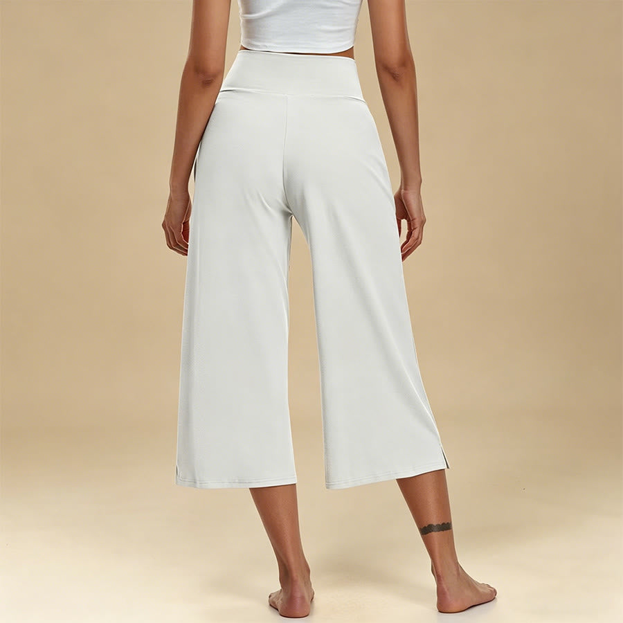 Pantaloni da yoga e fitness da donna Olivenorma Crossover a vita alta, cropped, a gamba larga e con tasche. - image 2