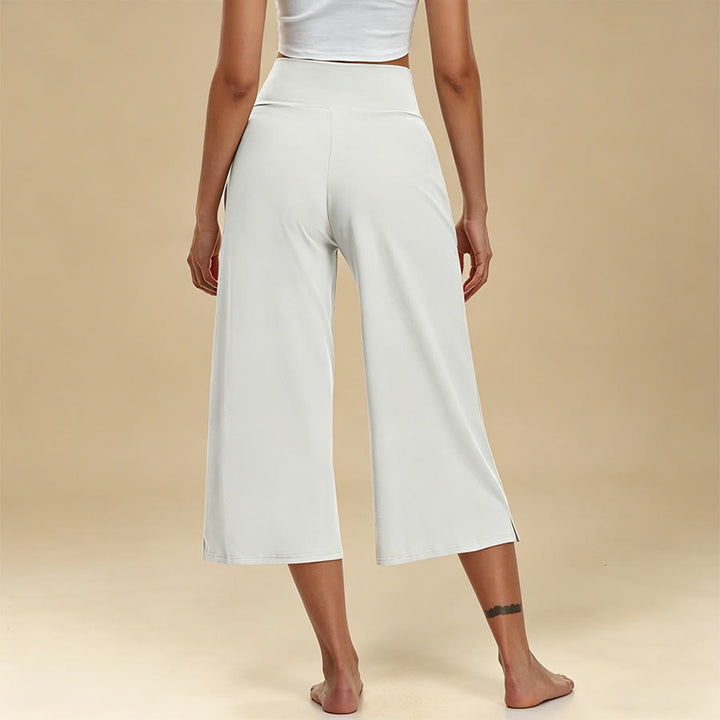 Pantaloni da yoga e fitness da donna Olivenorma Crossover a vita alta, cropped, a gamba larga e con tasche. - image 2