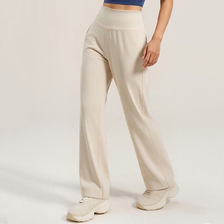 Pantaloni da yoga da donna Olivenorma Crossover a vita alta con spacco laterale e gamba larga, modello ampio e drappeggiato. - image 7