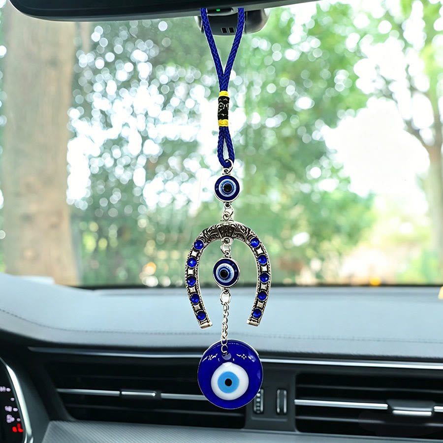 Ornamento da appendere per la casa Olivenorma con motivo retrò a ferro di cavallo e occhio di Allah. - Corda Blu - image 0