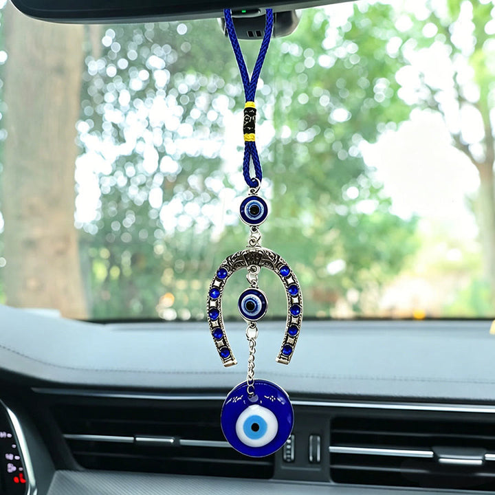 Ornamento da appendere per la casa Olivenorma con motivo retrò a ferro di cavallo e occhio di Allah. - Corda Blu - image 0