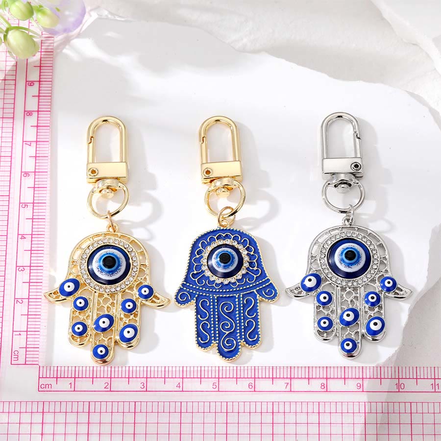 Ciondolo a forma di chiave Hamsa con occhio di Allah e strass intarsiati, Olivenorma - image 1