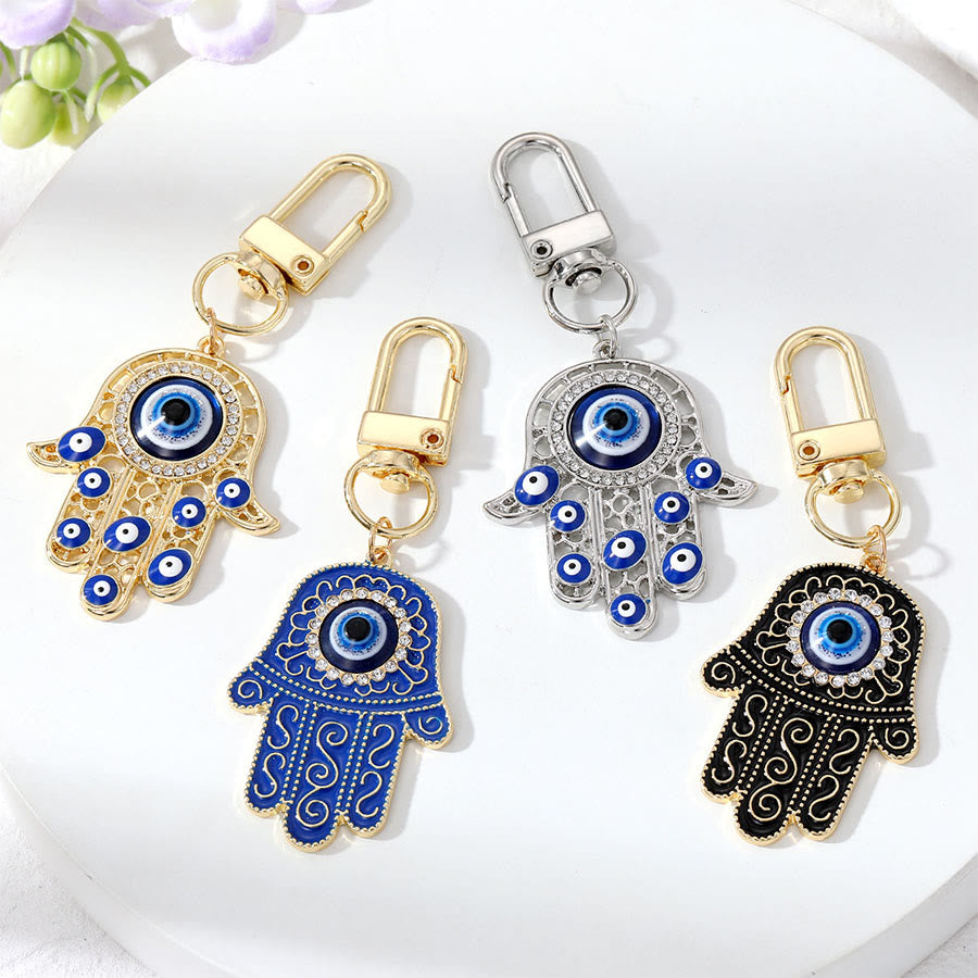 Ciondolo a forma di chiave Hamsa con occhio di Allah e strass intarsiati, Olivenorma - image 0